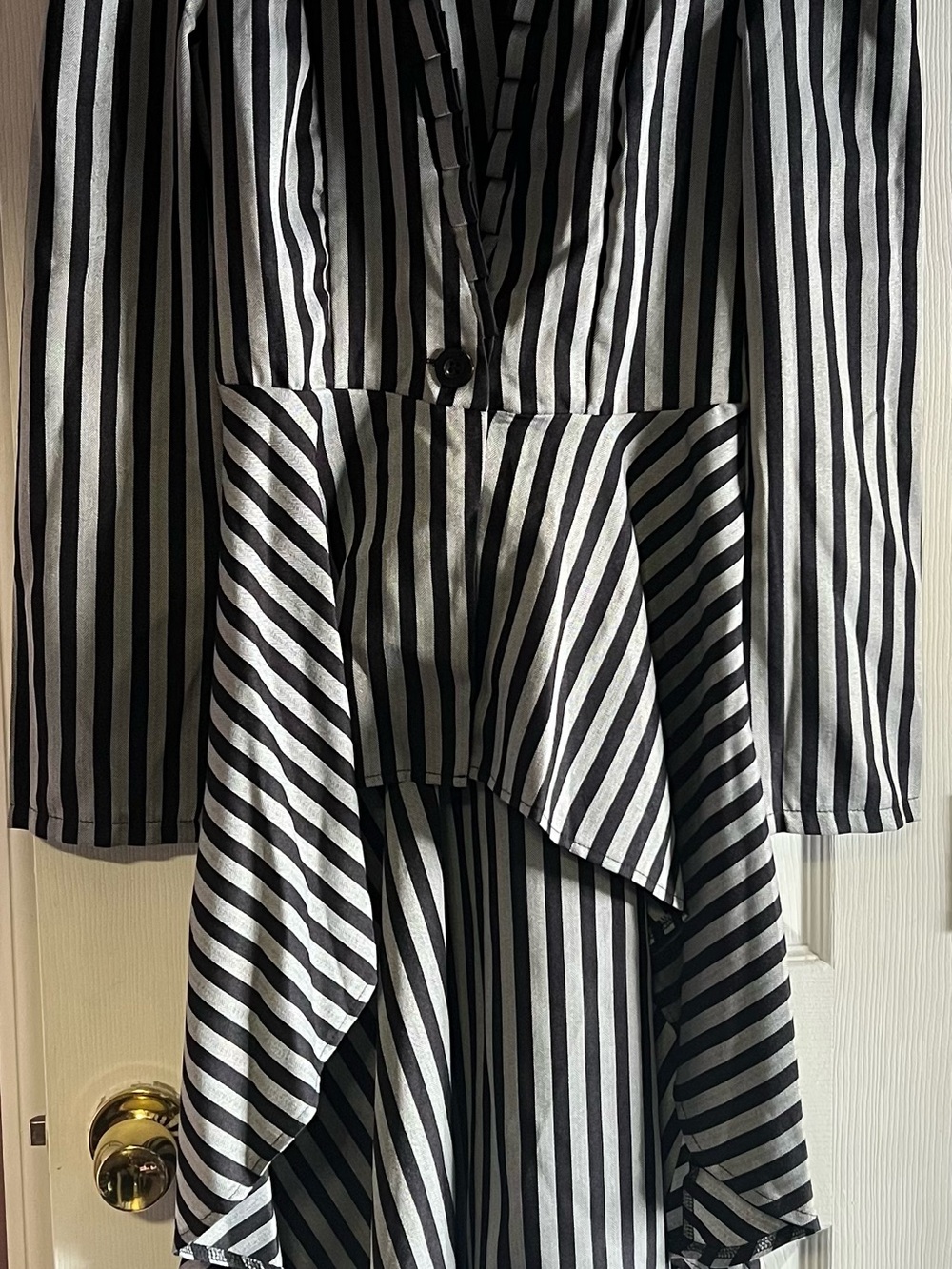 black-and-white striped high-low steampunk gothic tailcoat jacket.